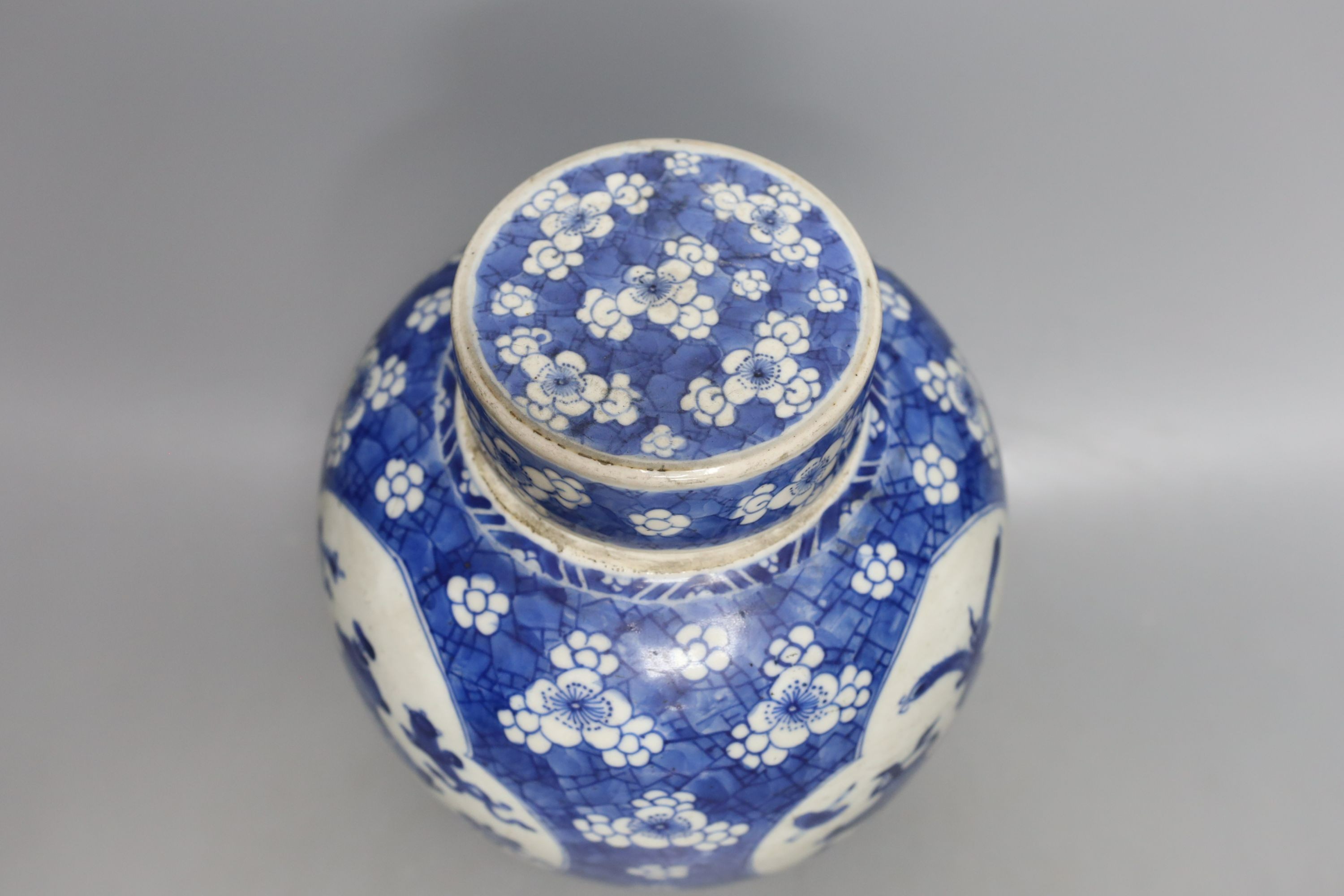 A Chinese Kangxi blue and white jar and cover 23cm